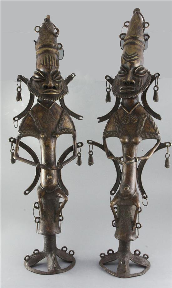 A pair of Yoruba tall bronze Ogboni Secret Society figures, height 80cm